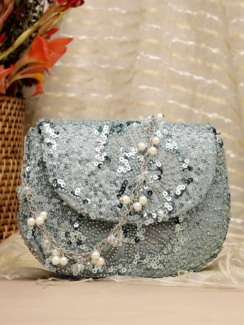 women embellished clutch with sling chain