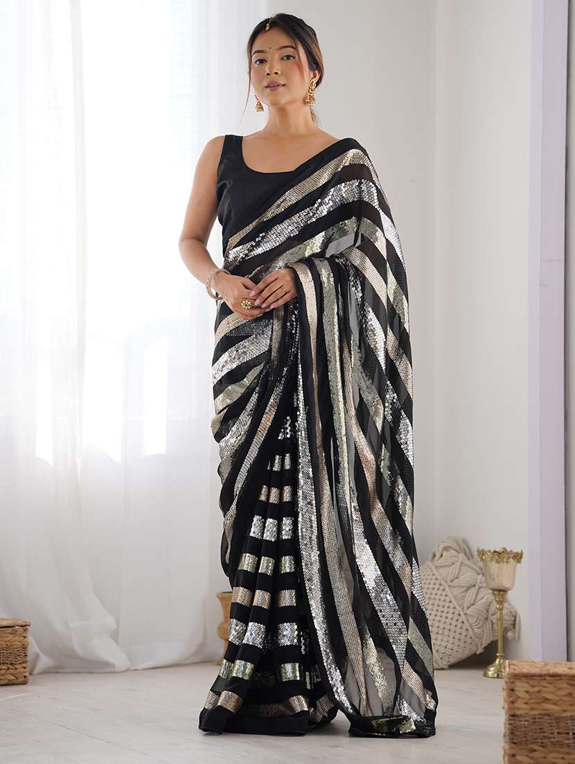 women solid with work embellished saree with blouse