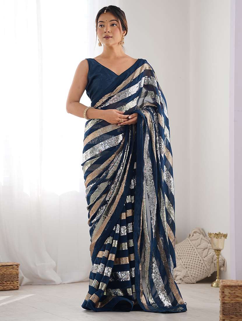 women solid with work embellished saree with blouse