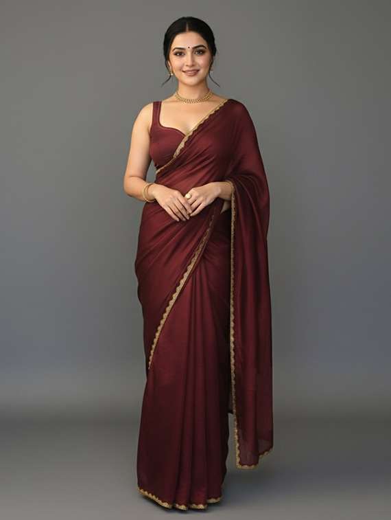 women solid with embellished bordered saree with blouse