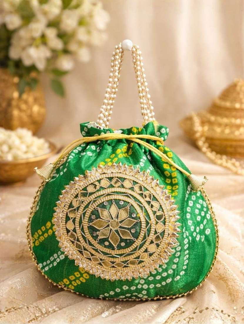 women embellsihed potli bag