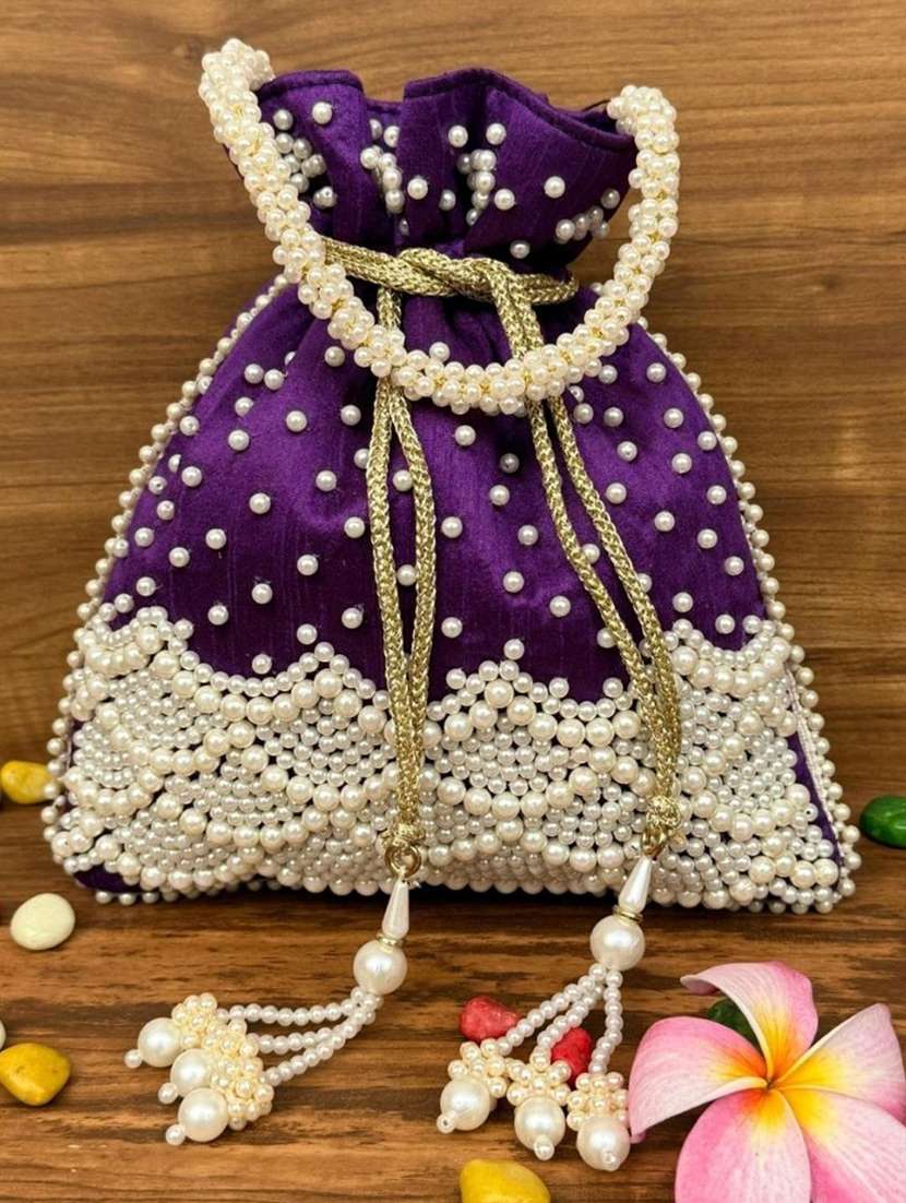 women embellished potli bag