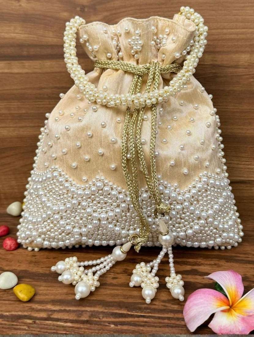 women embellished potli bag