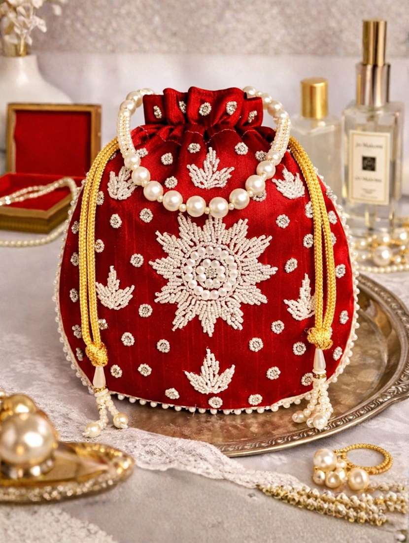 women embellished potli bag