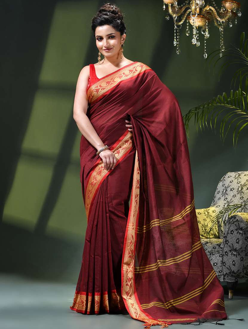 women solid with bordered saree
