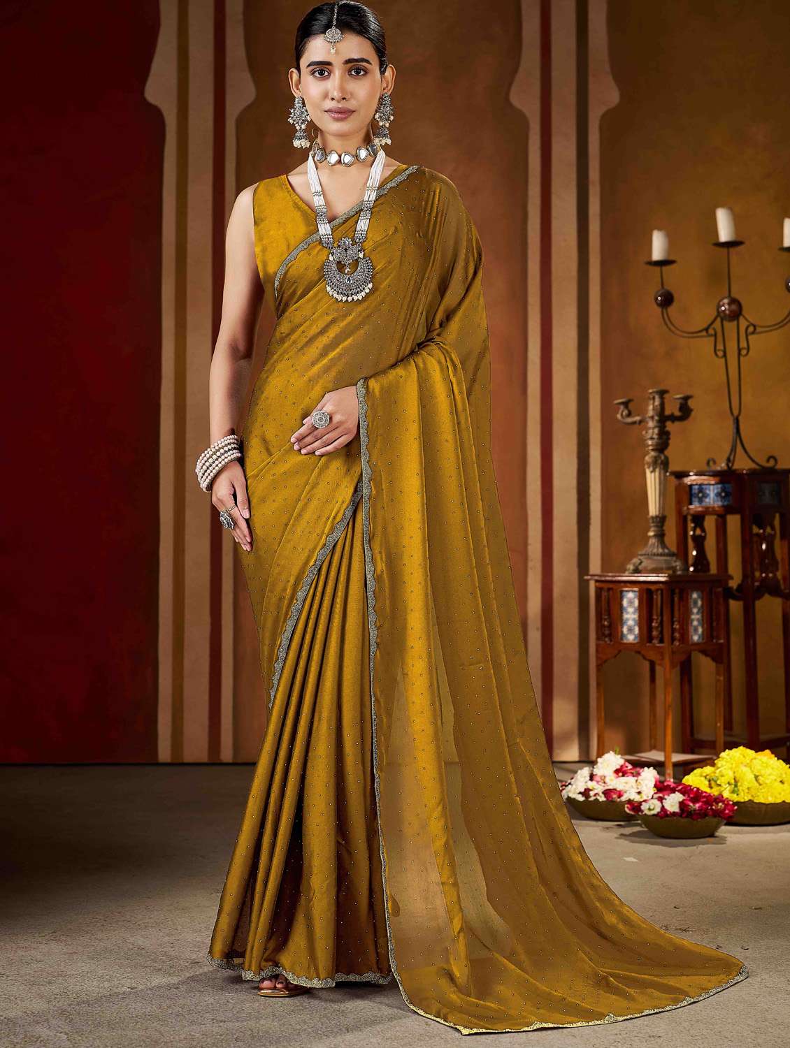 women solid with embellished bordered saree with blouse