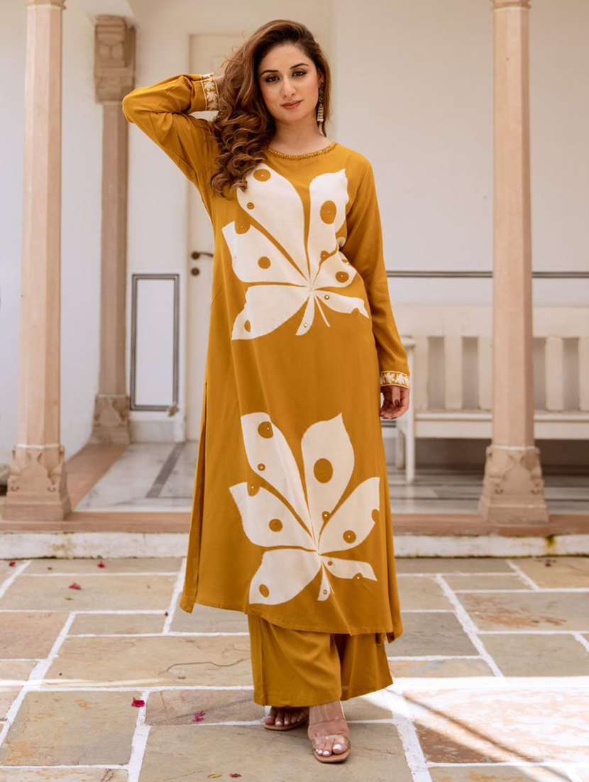 women mustard kurta and palazzo set