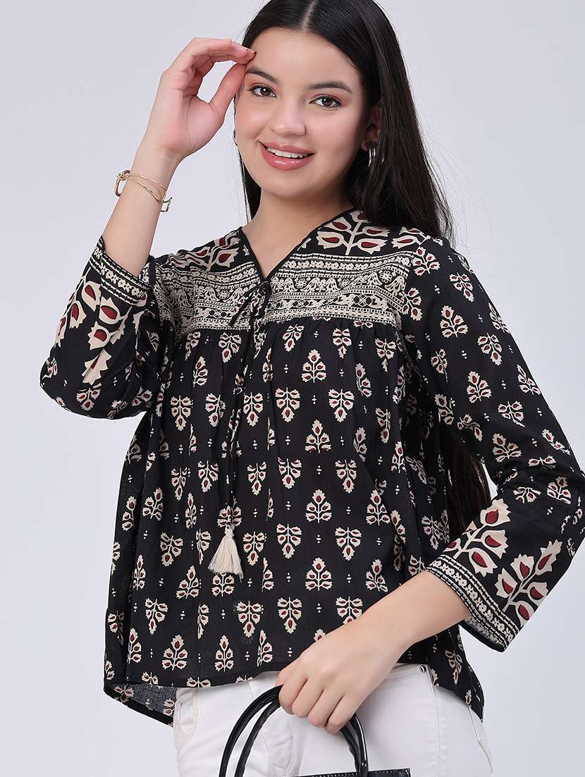 women printed three quarter sleeves regular top