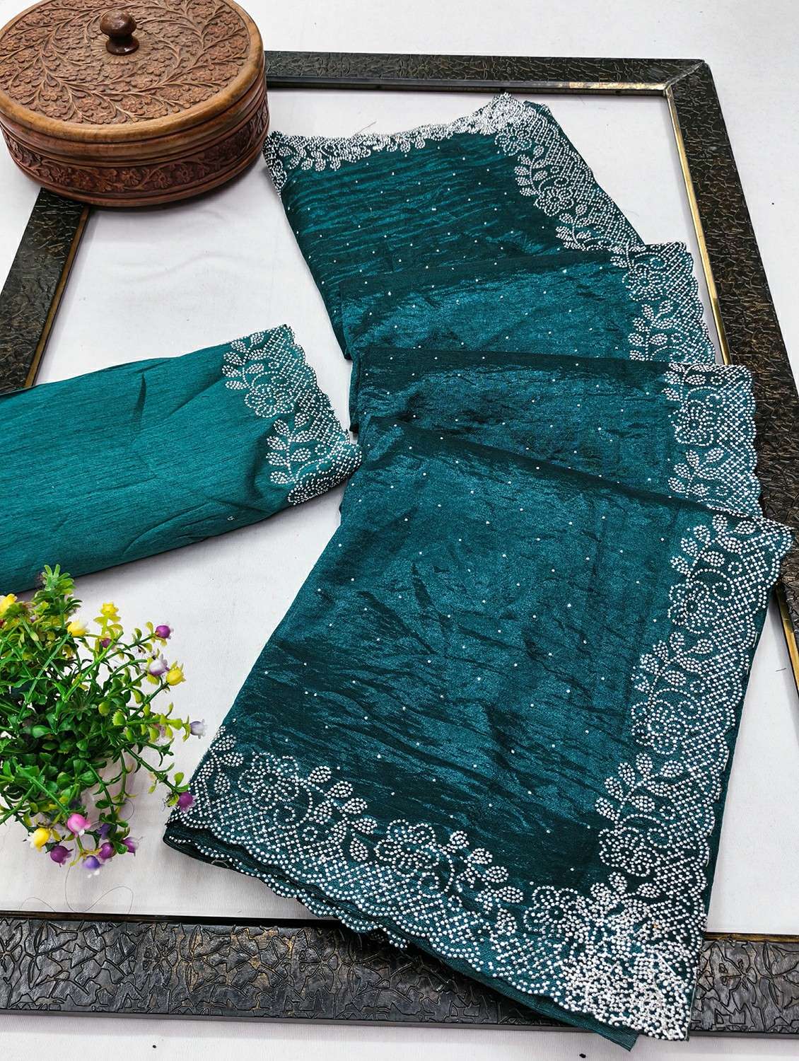 women solid with work embellished saree with blouse