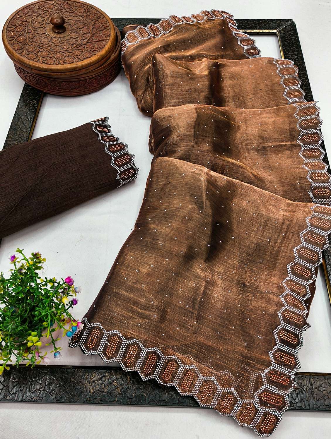 women solid with work embellished saree with blouse