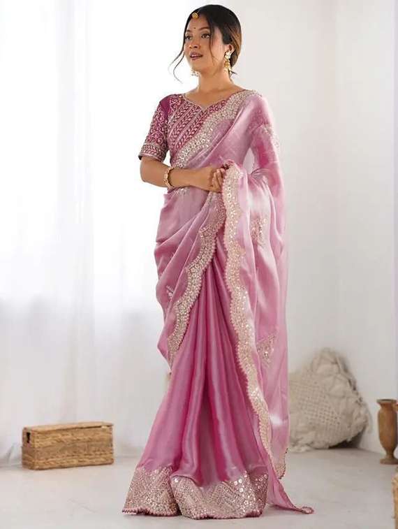 women solid with work embroidered saree with blouse