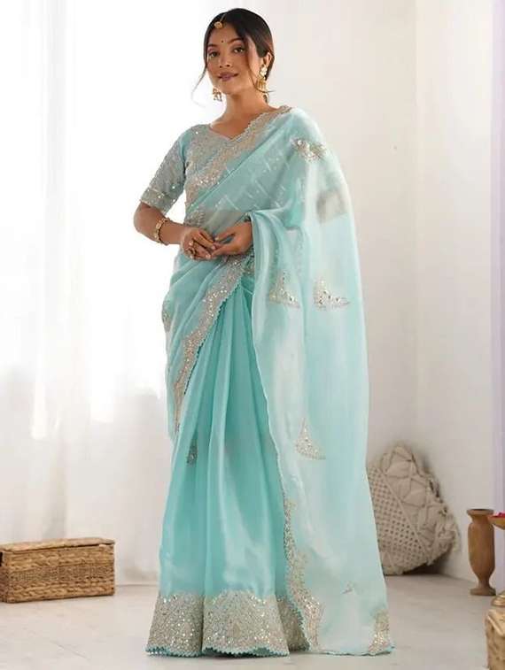 women solid with work embroidered saree with blouse