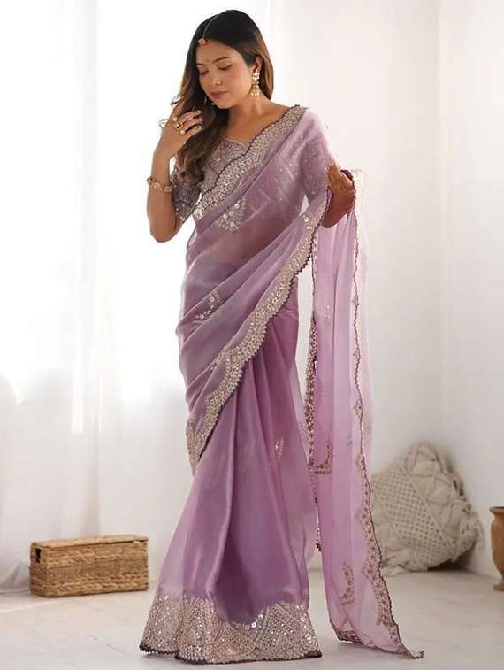 women solid with work embroidered saree with blouse