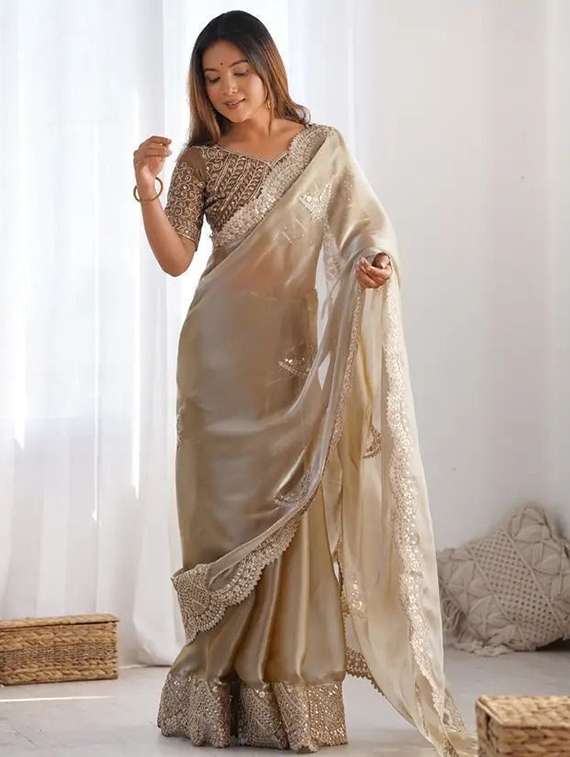 women solid with work embroidered saree with blouse