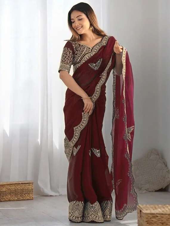 women solid with work embroidered saree with blouse