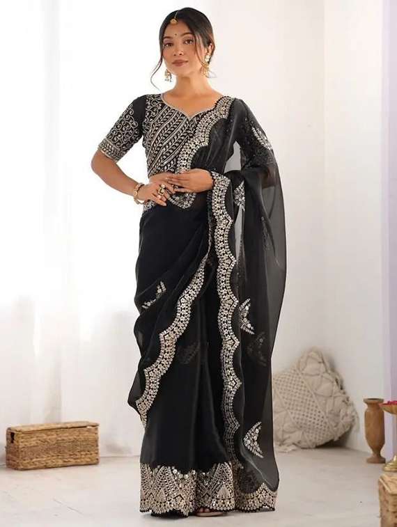 women solid with work embroidered saree with blouse