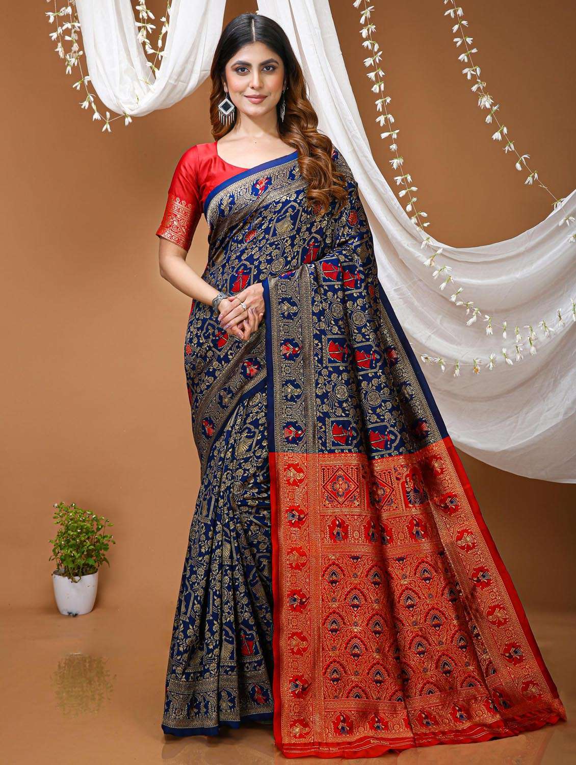 women self design banarasi saree with blouse