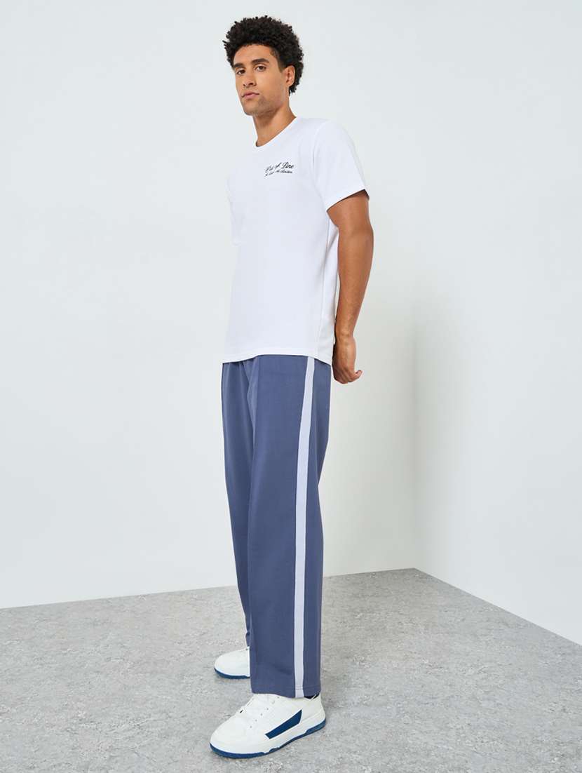 men side taped relaxed fit full length track pant - 22394902 -  Standard Image - 3
