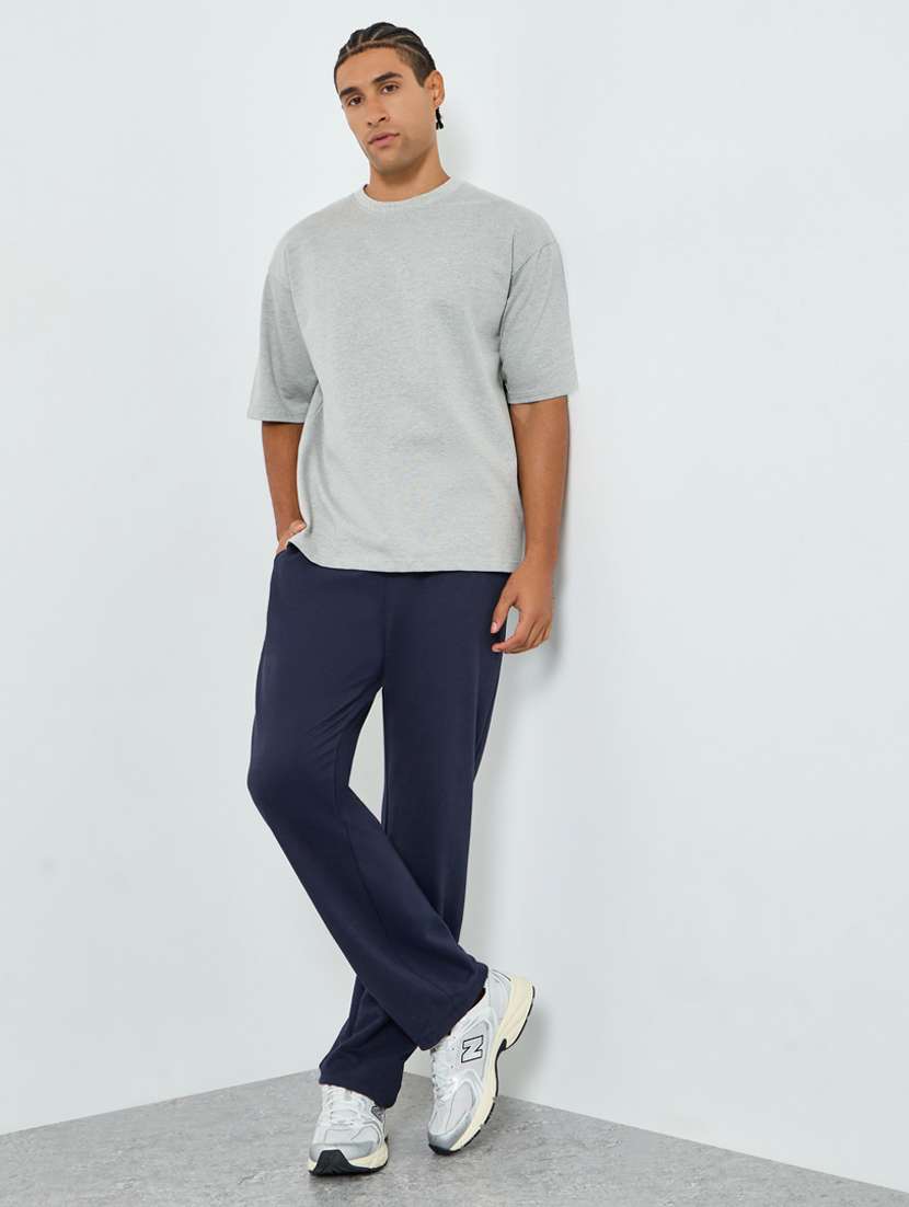 men solid relaxed fit full length track pant - 22394907 -  Standard Image - 3