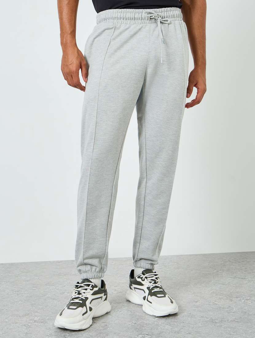men solid mid rise relaxed fit jogger