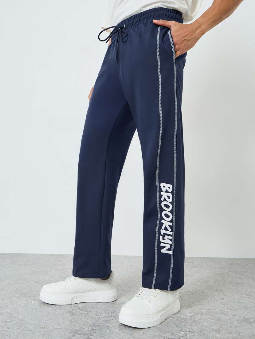 men typographic mid rise full length track pant