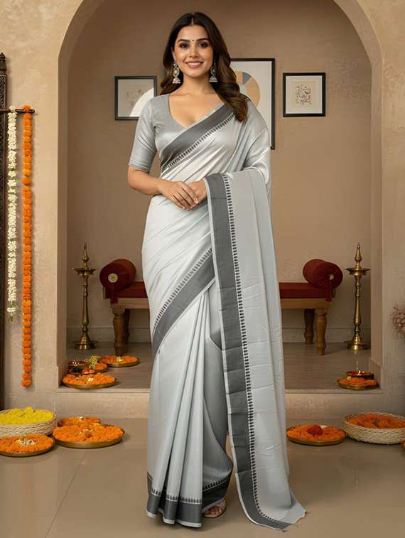 women solid with bordered saree with blouse