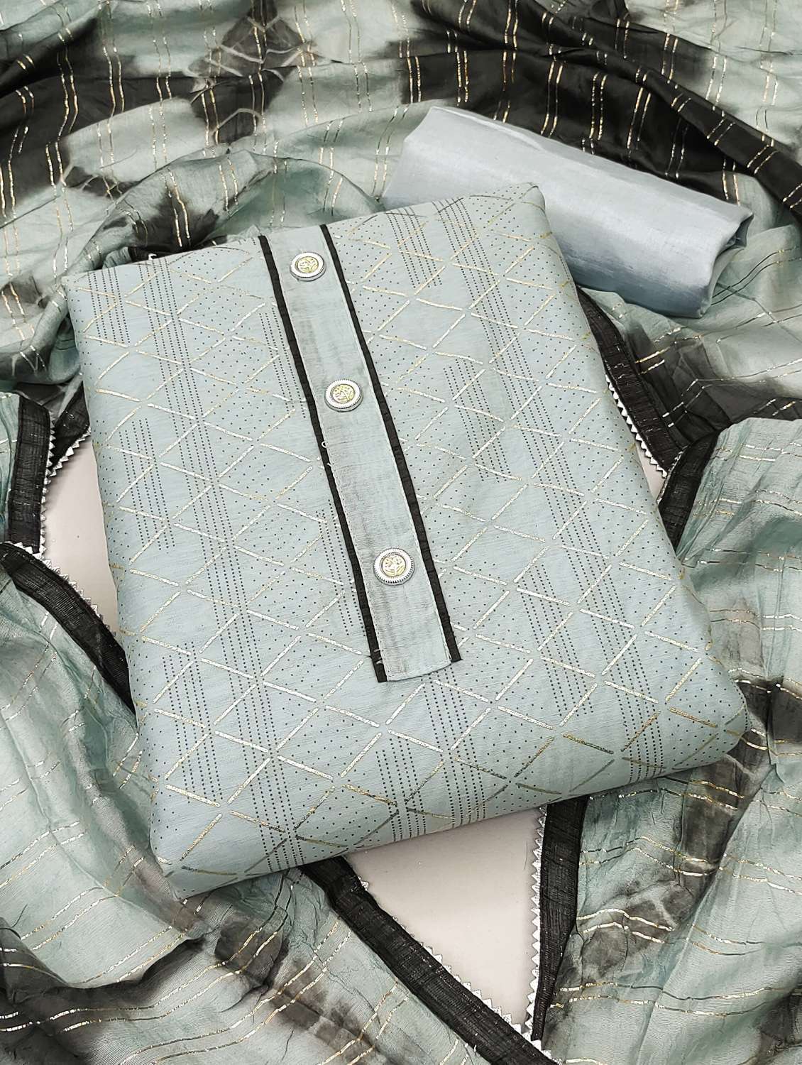 women printed unstitched suit set