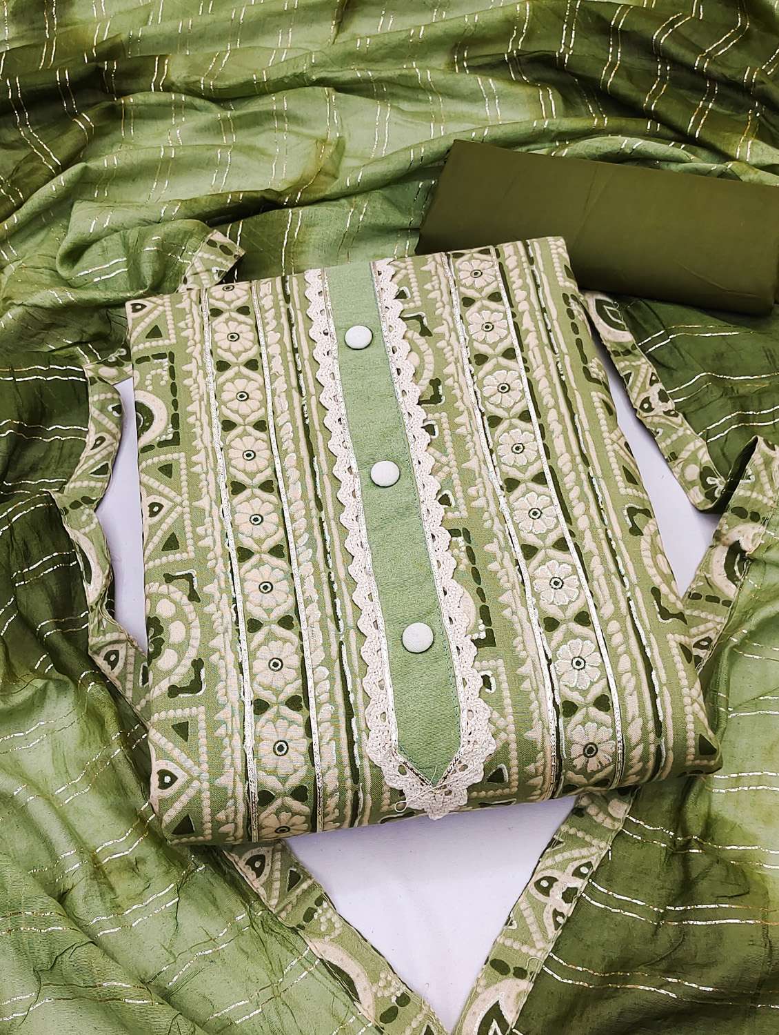 women printed unstitched suit set