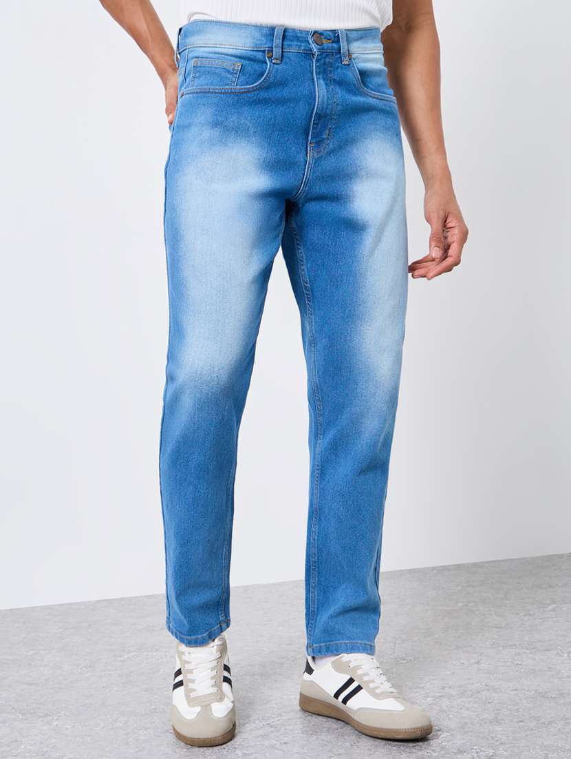 men washed mid rise full length tapered jeans