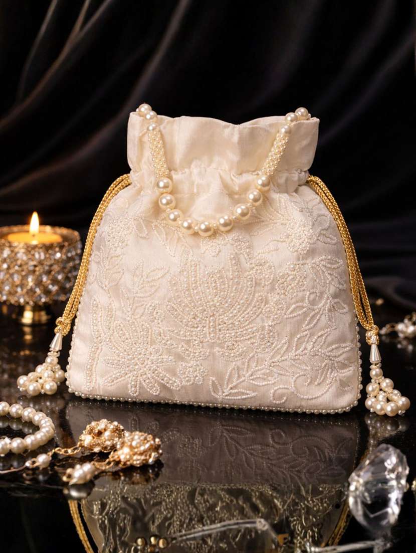 women solid with work embellished potli