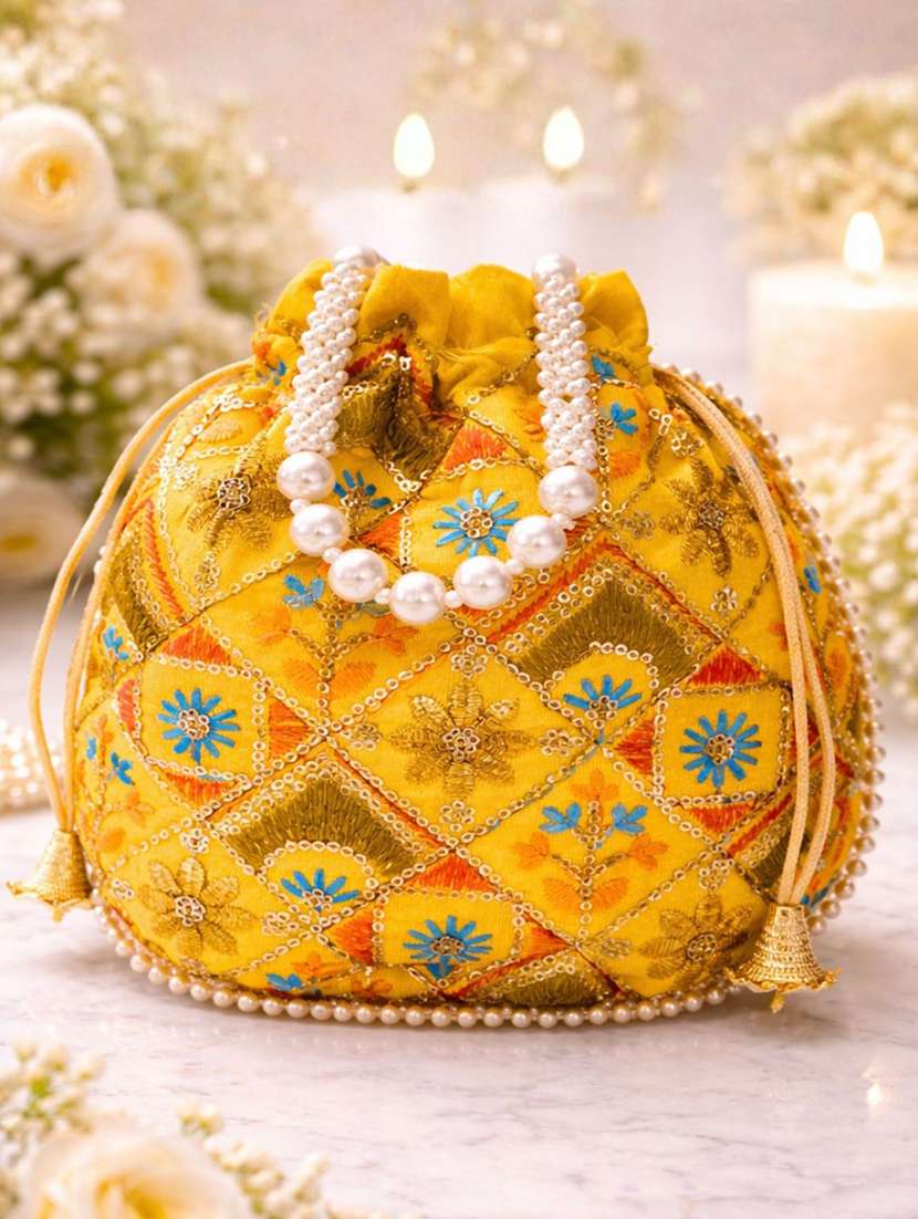 women solid with work embroidered potli
