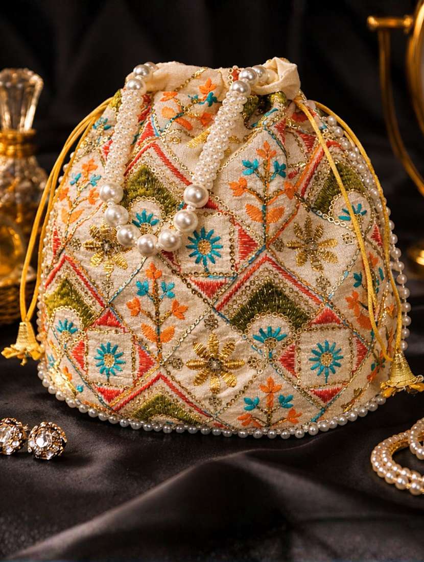 women solid with work embroidered potli