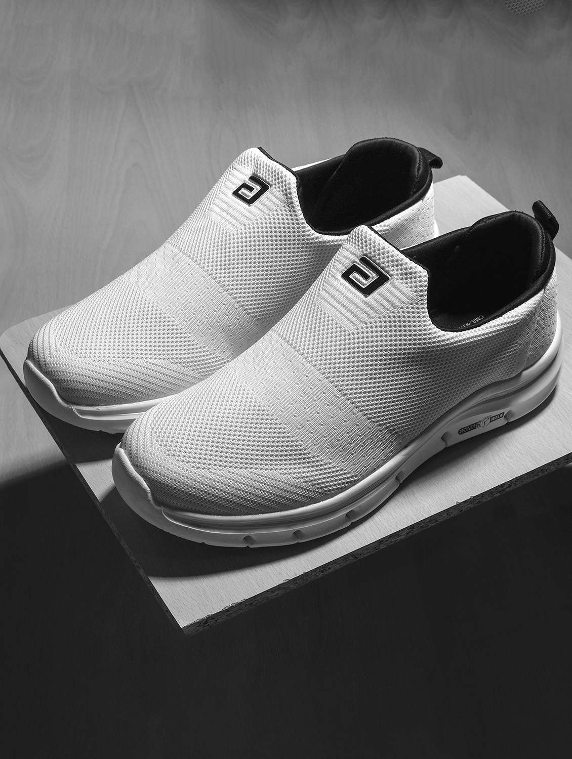 men white slip on sport shoe