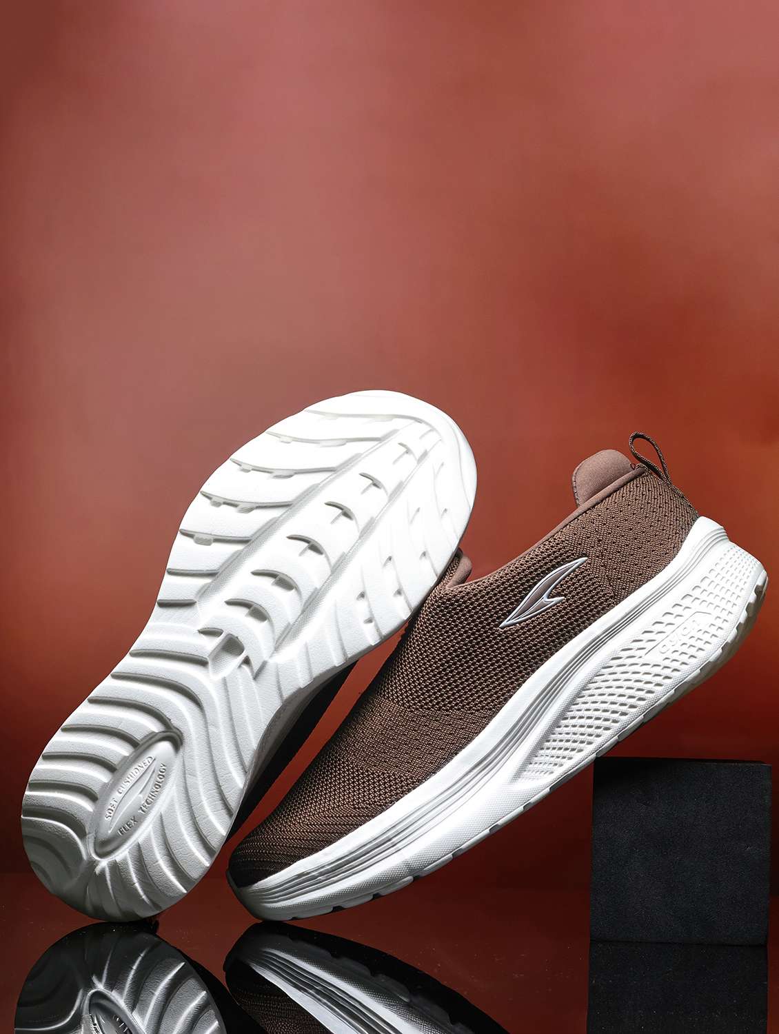 men brown slip on sport shoe
