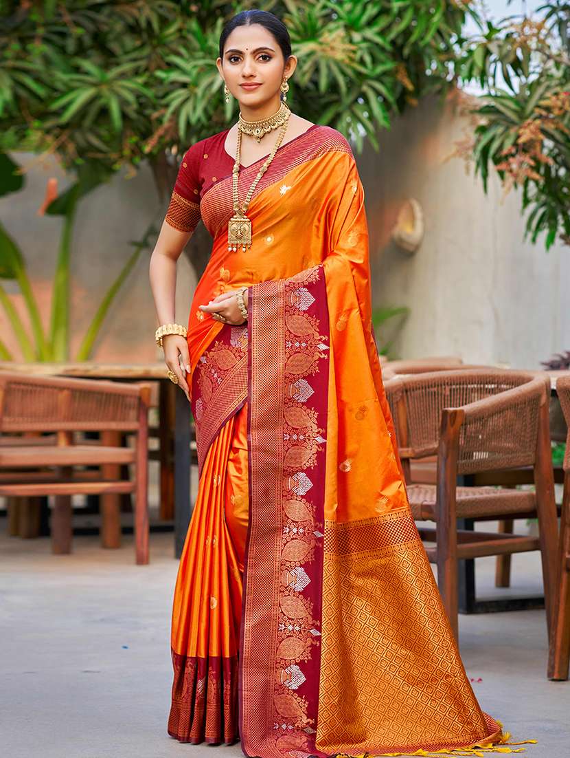 women self design banarasi saree with blouse