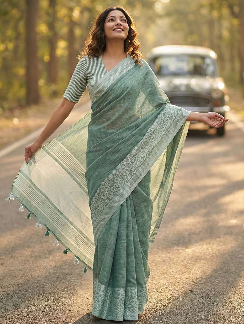 women self design bordered saree with blouse