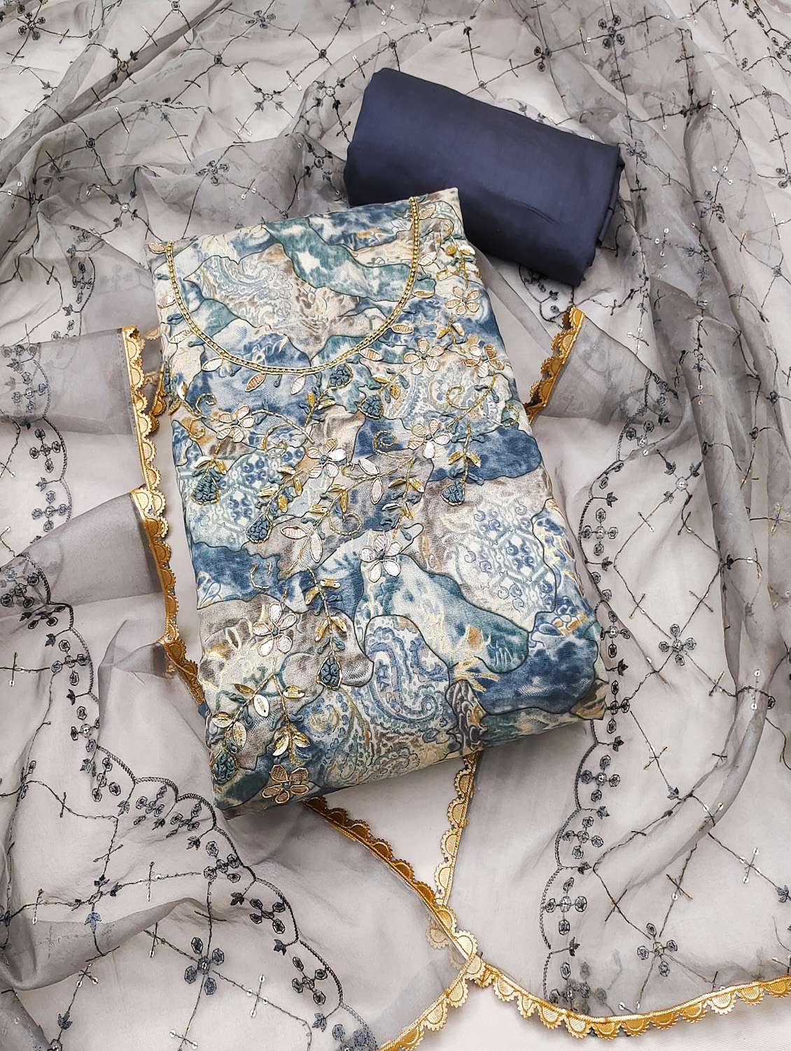 women printed unstitched suit set