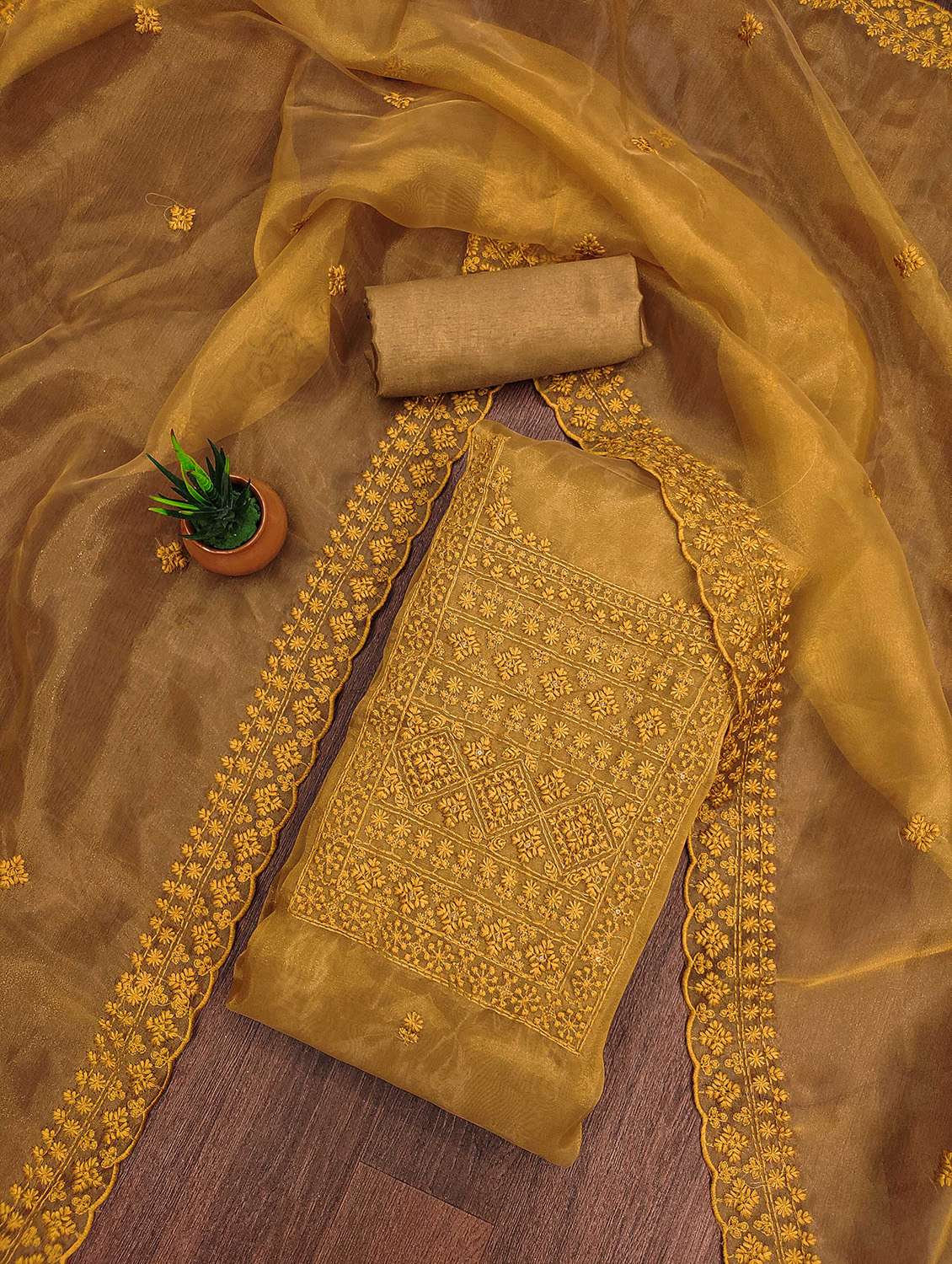 women solid with work unstitched suit set