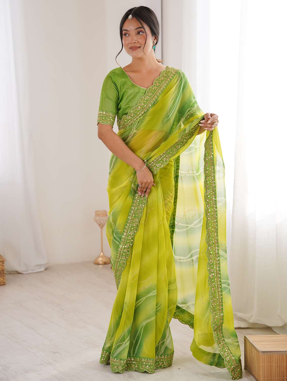 women printed bordered saree with blouse