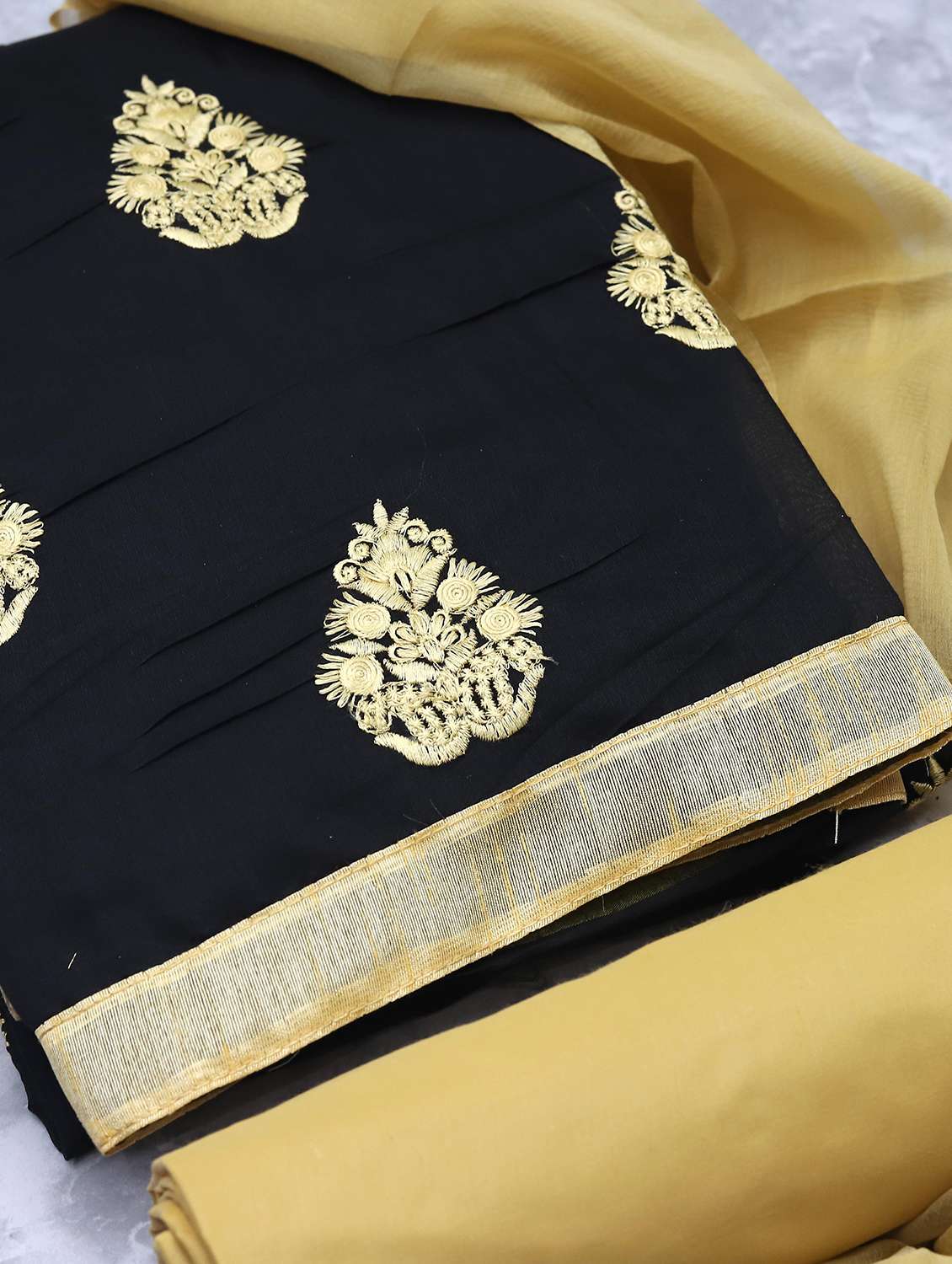 women solid with work unstitched suit set
