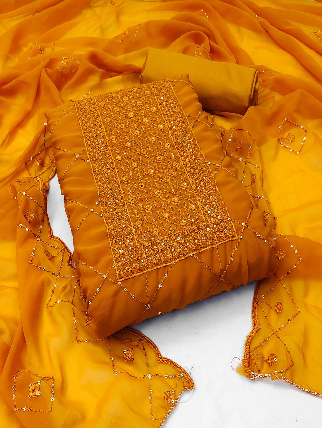 women solid with work unstitched suit set