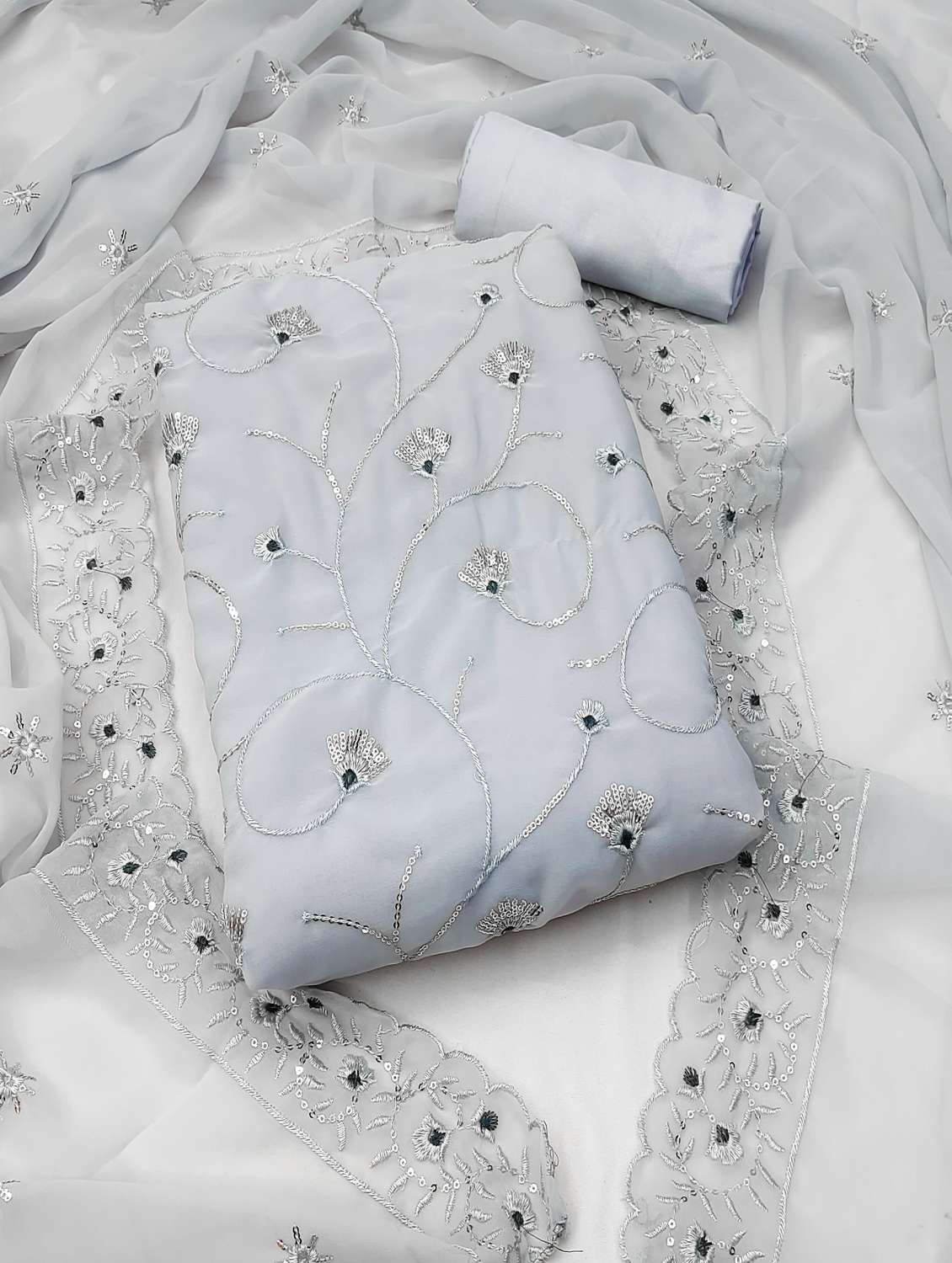 women solid with work unstitched suit set