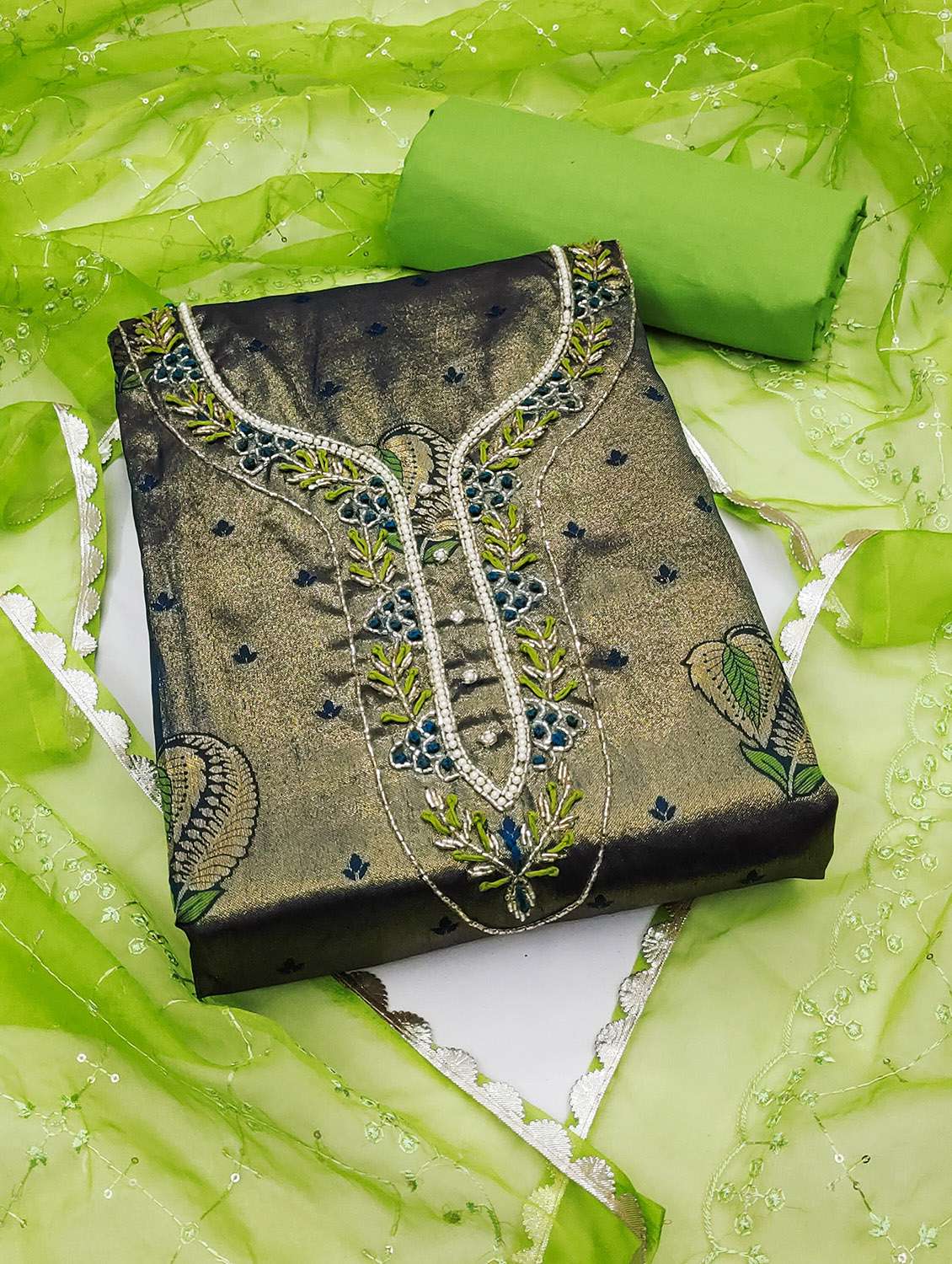 women self design unstitched suit set