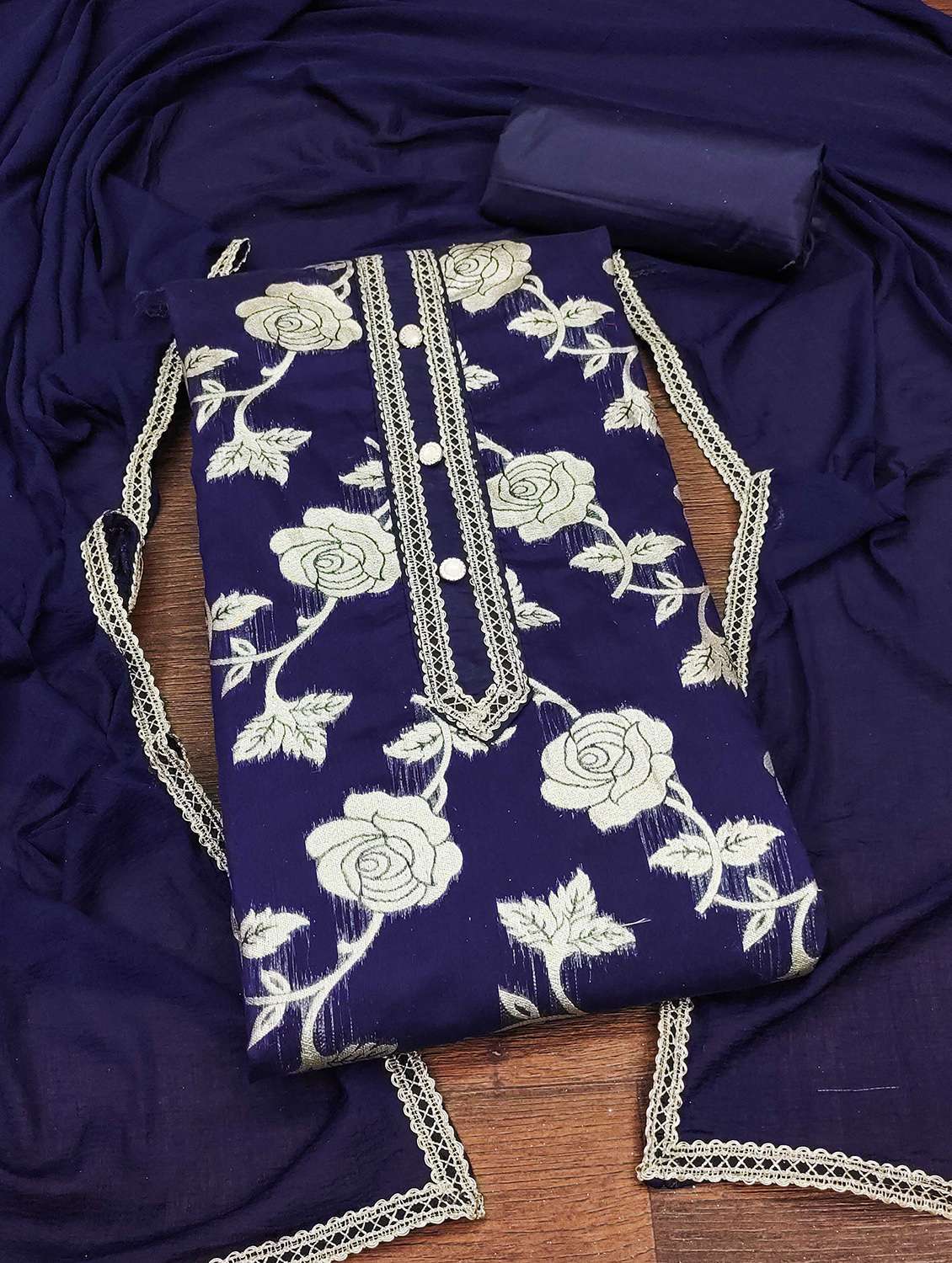 women self design unstitched suit set