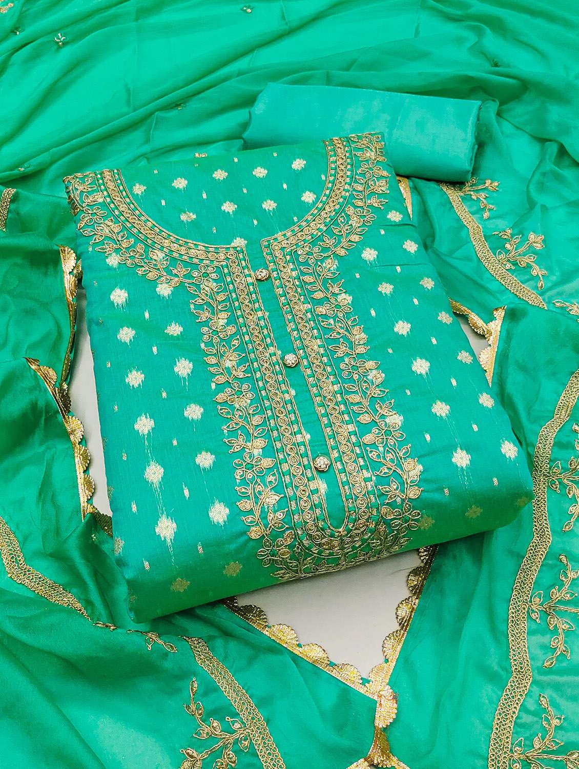 women self design unstitched suit set