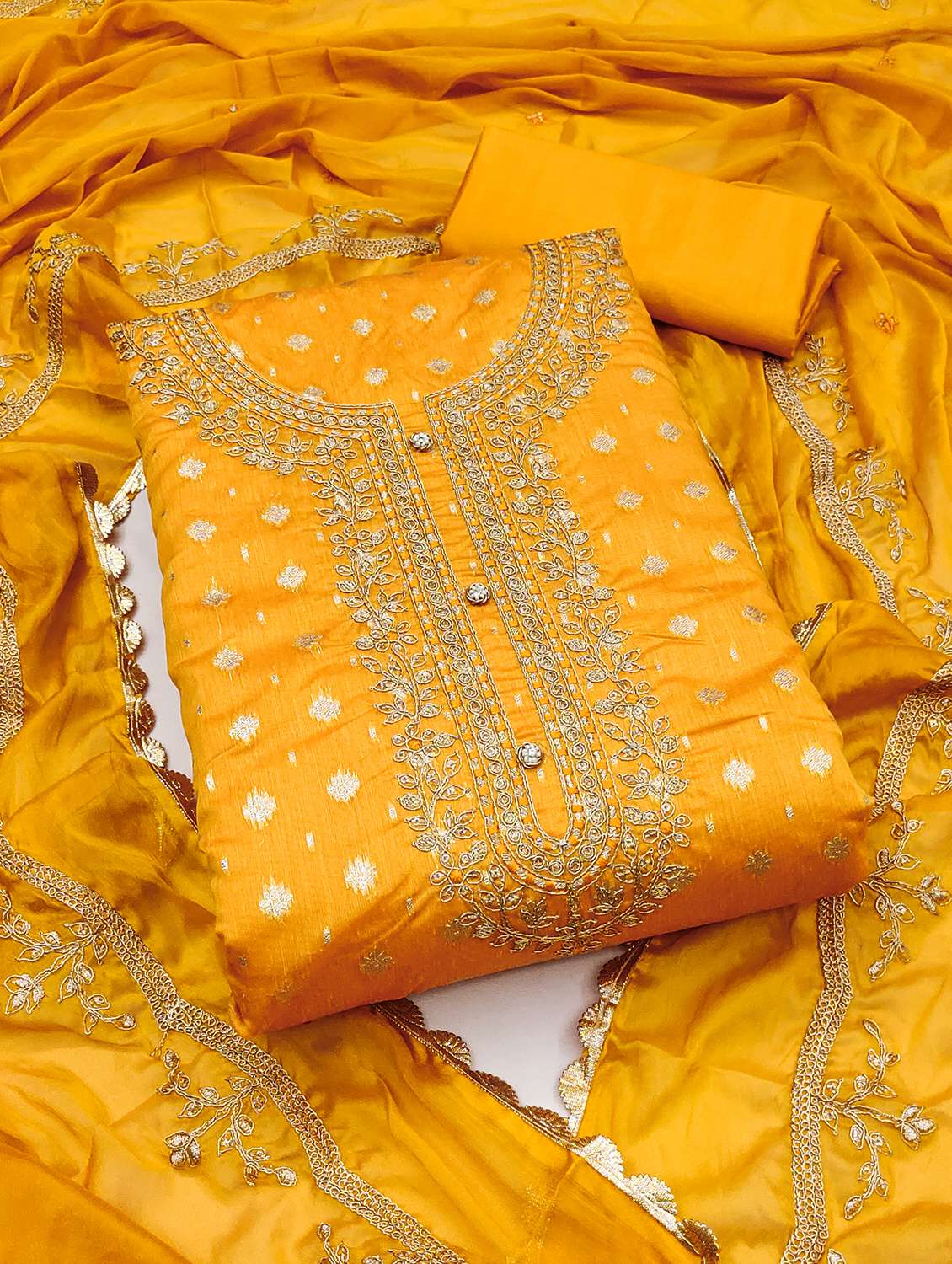 women self design unstitched suit set