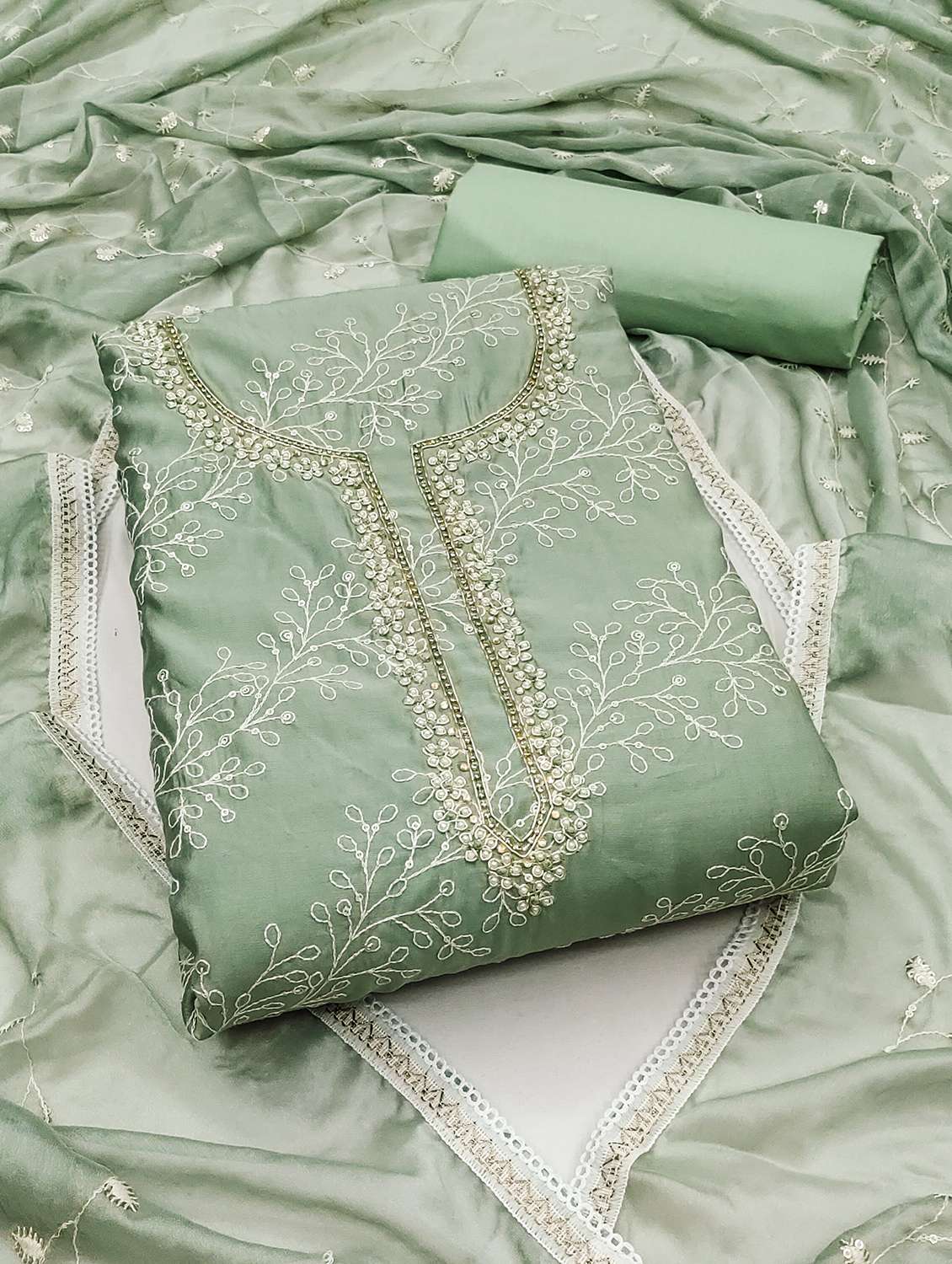 women solid with work unstitched suit set