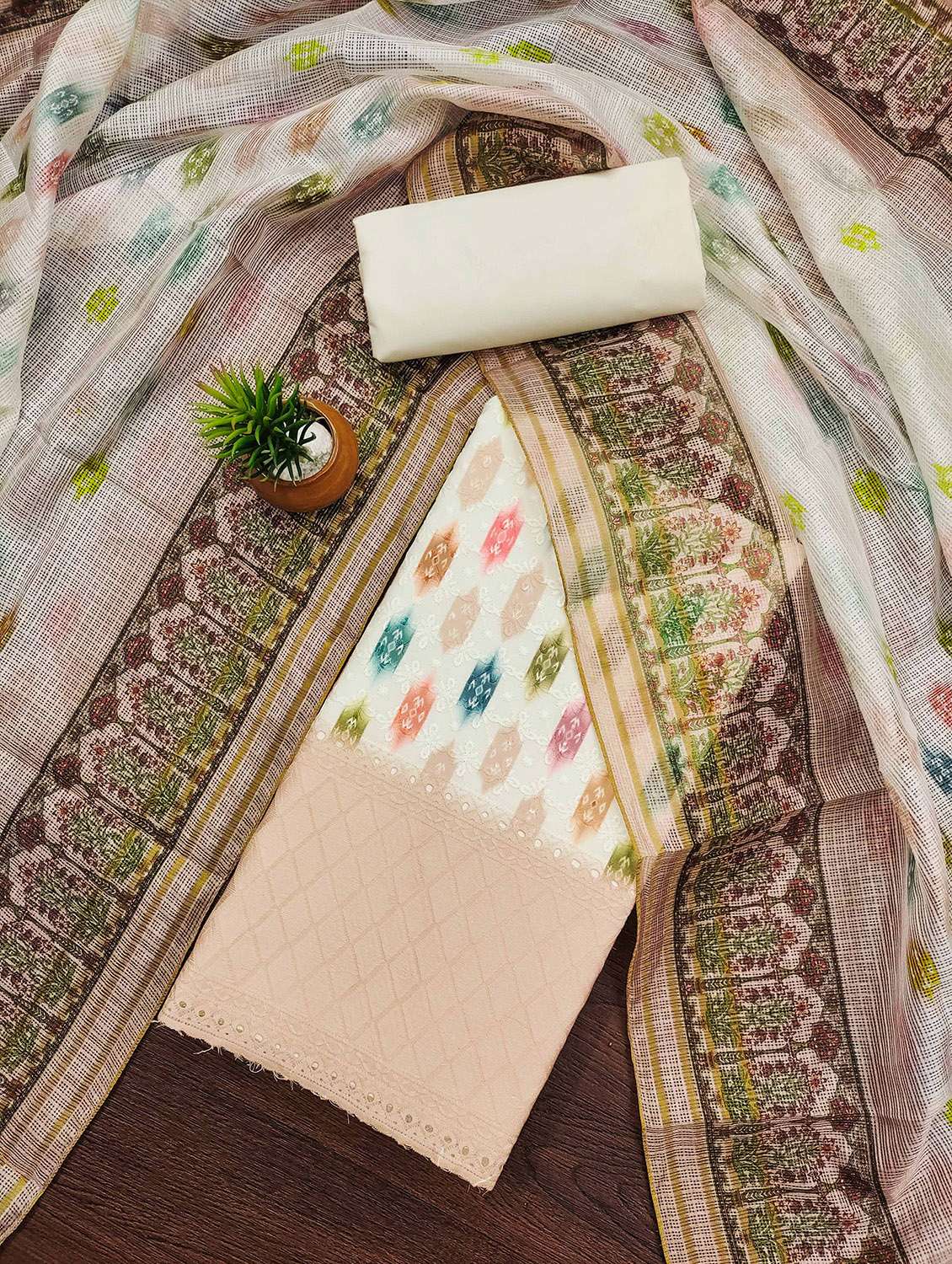 women printed unstitched suit set