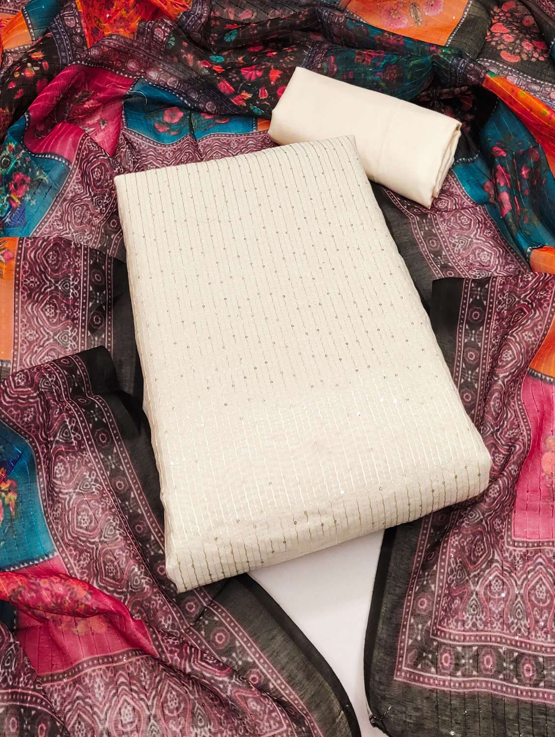 women solid with work unstitched suit set