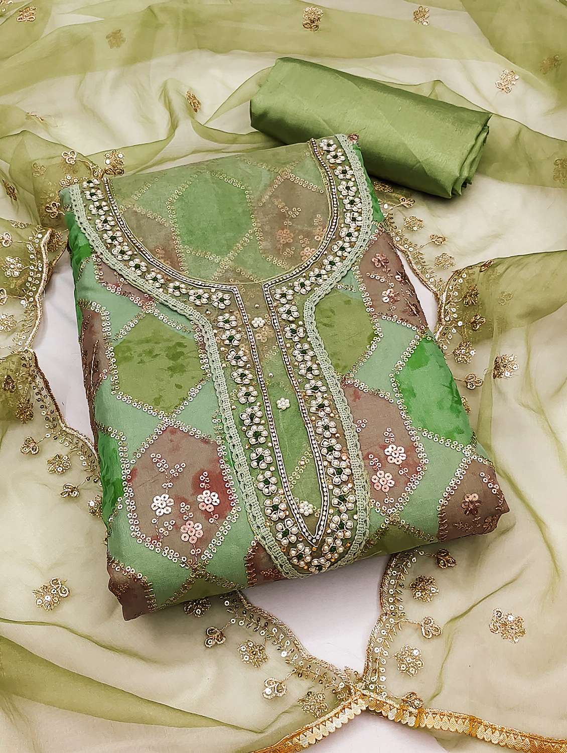 women printed unstitched suit set